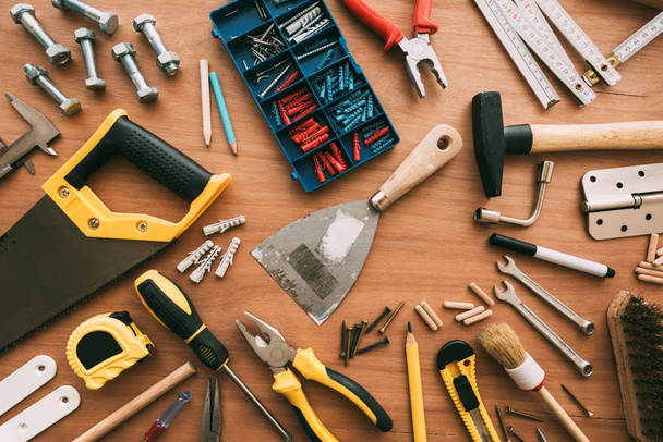 Repairman tools top view on workshop desk - 写真・画像