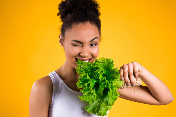 African American girl holding salad isolated. - Foto, Imagen