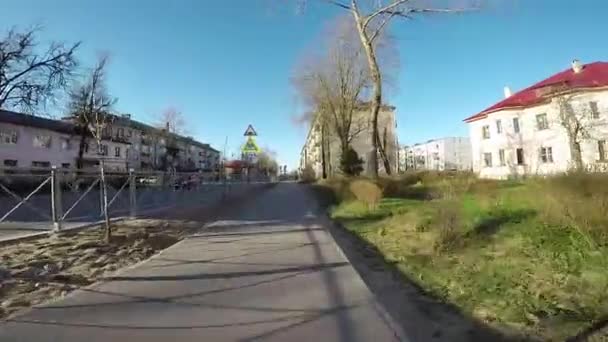 Riding a bike around the city. First-person view. POV video - Video, Çekim