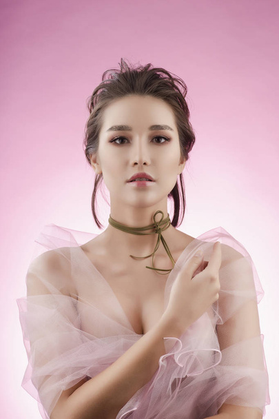 Beautiful sensual young big breast asian girl wearing pink veil  - Фото, зображення
