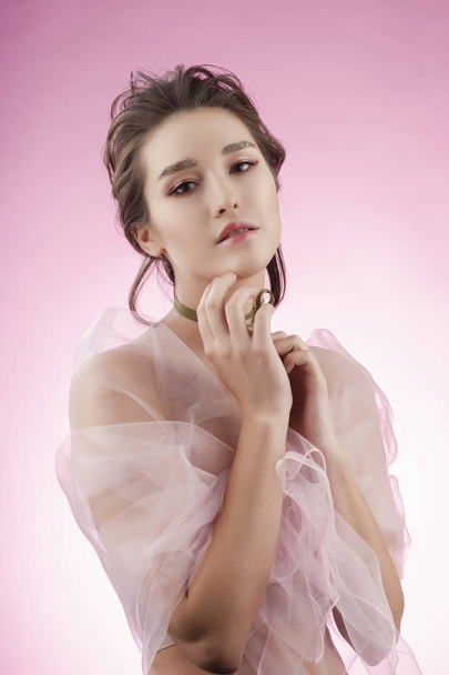 Beautiful charming young big breast asian girl wearing a pink ve - Zdjęcie, obraz