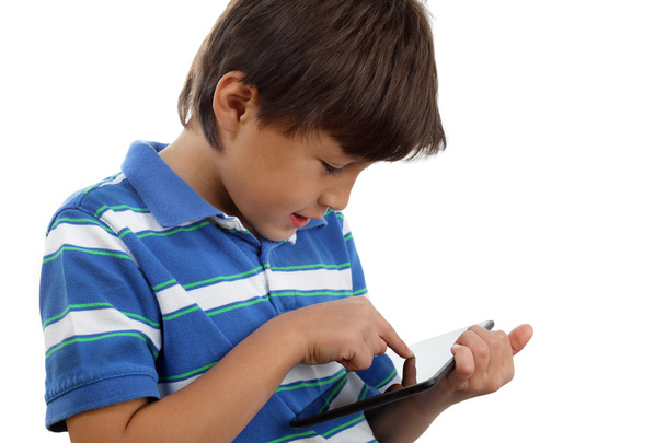 Boy using touch screen tablet - Fotó, kép