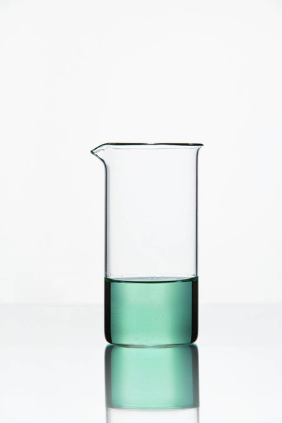 Laboratory Equipment. Glass With Colorful Liquid - Φωτογραφία, εικόνα