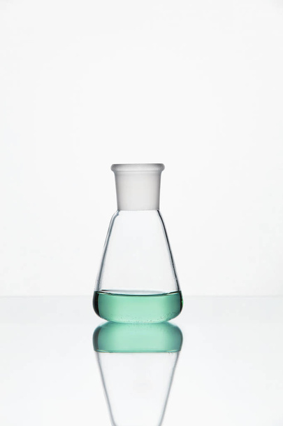 Laboratory Equipment. Glass With Colorful Liquid - Foto, afbeelding