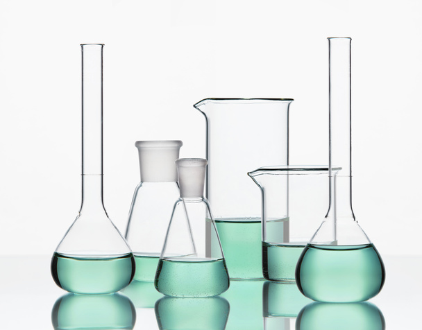 Laboratory Supplies. Glassware With Colorful Chemical Liquid - 写真・画像