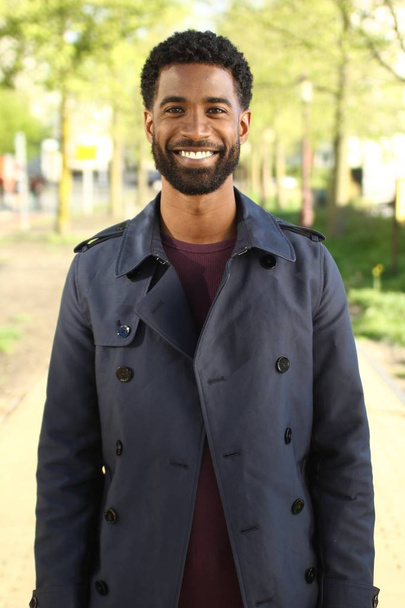 Beautiful happy afro-american man outside - Photo, image