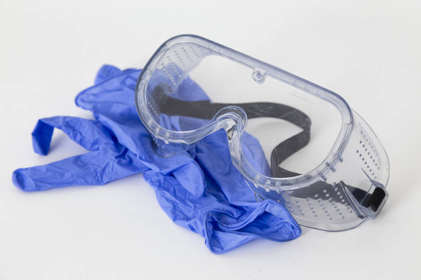 óculos e luvas de proteção, segurança no trabalho
 - Foto, Imagem