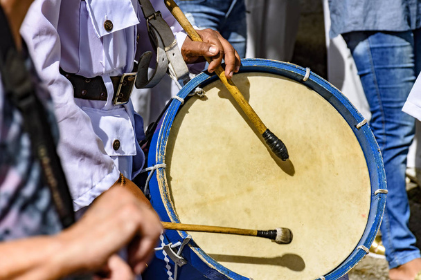 Drums being played in celebration of Brazilian folklore in honor of Saint Jorge - 写真・画像