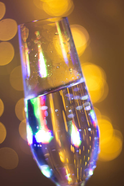 Champagne glass in disco party bar - Fotó, kép