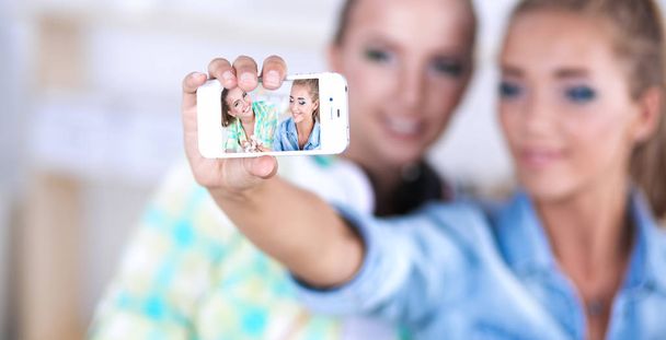 Two young women taking a selfie together - Zdjęcie, obraz