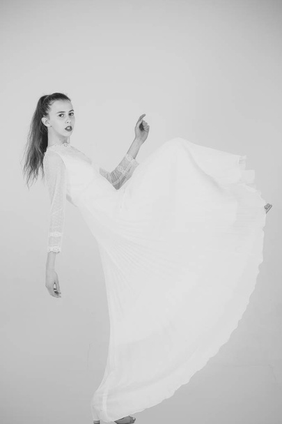 Girl in white fashionable dress. - Fotoğraf, Görsel