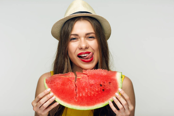 smiling woman showing tongue out holding big slice of watermelon, concept of vitamin summer diet  - Foto, immagini