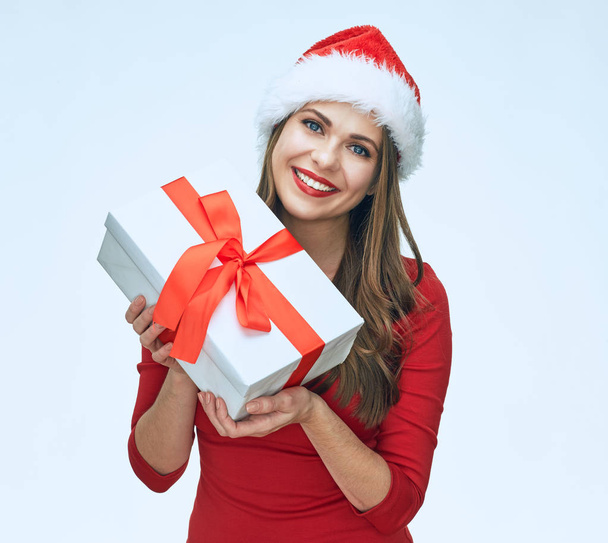 Smiling Santa girl holding gift box.  - Fotografie, Obrázek