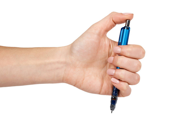 Sininen mekaaninen kynä kädessä. Eristetty valkoisella taustalla. Toimistopaperi, työväline, yritystyökalu
 - Valokuva, kuva