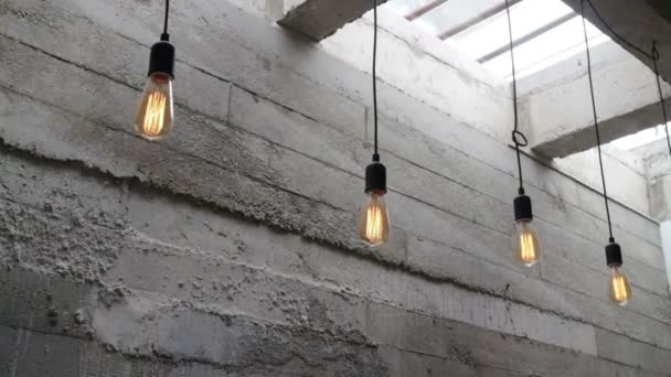 Vintage interior hanging light bulb in loft room, stock footage - Footage, Video