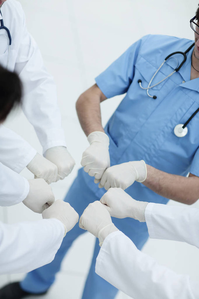 Doctors and nurses coordinate hands. - Valokuva, kuva