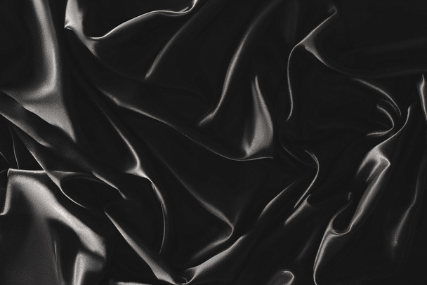 pełna klatka czarne eleganckie tkaniny jedwabne, jako tło - Zdjęcie, obraz