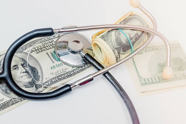 Stetoskooppi rahaa - lääketieteellinen käsite
 - Valokuva, kuva