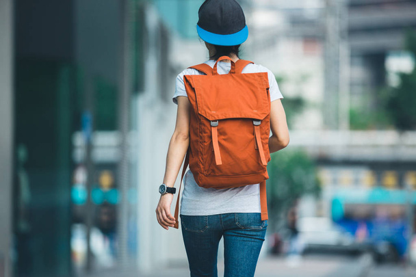 young woman walking in modern city - Fotó, kép