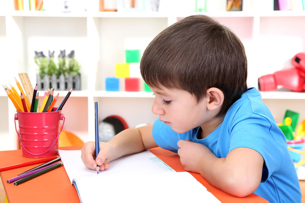 Cute little boy drawing in his album - Photo, Image