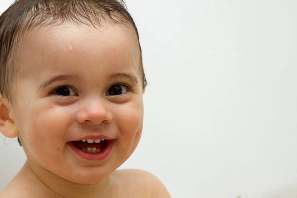 Beautiful baby one years old outside with wet hair. Bath. on white background - Foto, imagen