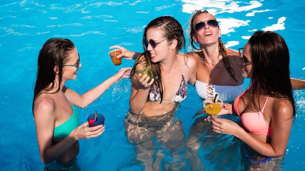 friends having fun in pool - Foto, immagini
