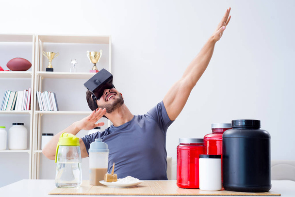 Uomo con barattoli nutrizionali e occhiali di realtà virtuale - Foto, immagini
