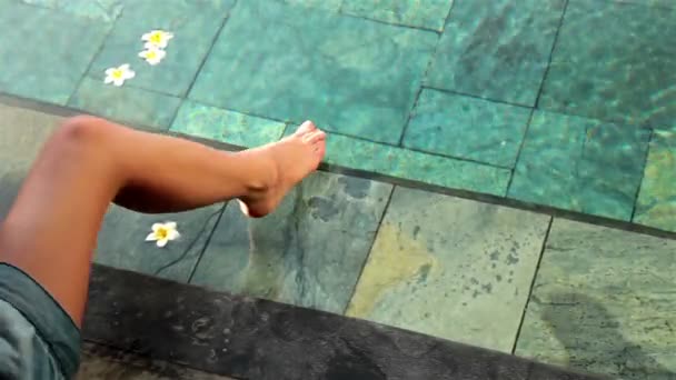 young woman by the pool - Felvétel, videó