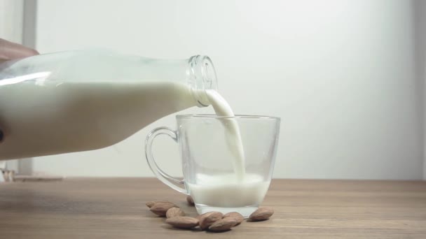 milk bottle pouring organic - Footage, Video