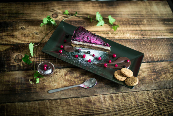 Homemade cheesecake with fresh berries and chocolate - Photo, Image