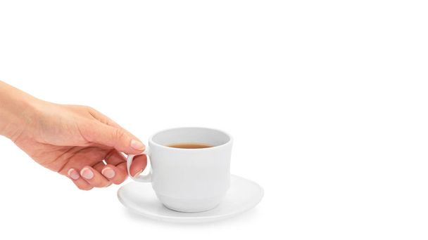 Female hand holds a cup of tea. Isolated on white background. copy space, template - Foto, Imagem