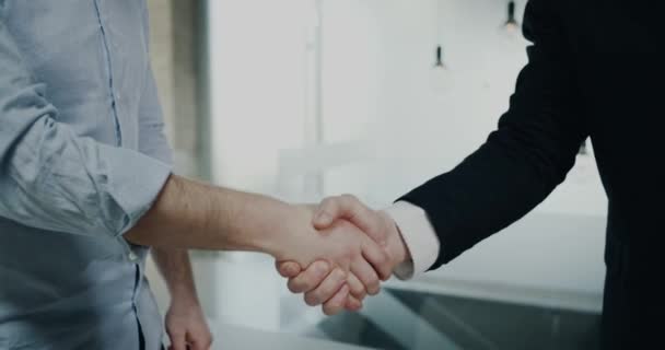 Closeup business partners holding hand of each other. - Footage, Video