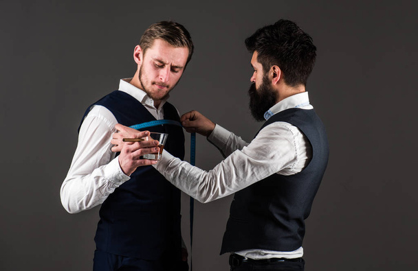 Tailor measure chest for sewing suit, grey background. - Fotó, kép