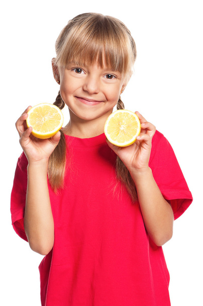 Little girl with lemon - Fotografie, Obrázek