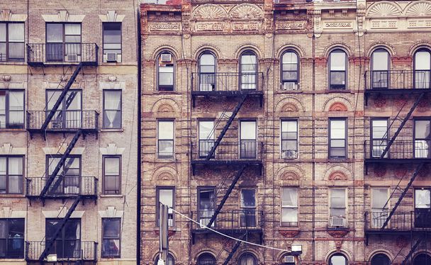 Old buildings with fire escapes in New York City. - Φωτογραφία, εικόνα