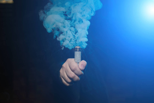 Dripper in one hand making a cloud of fume - Photo, Image