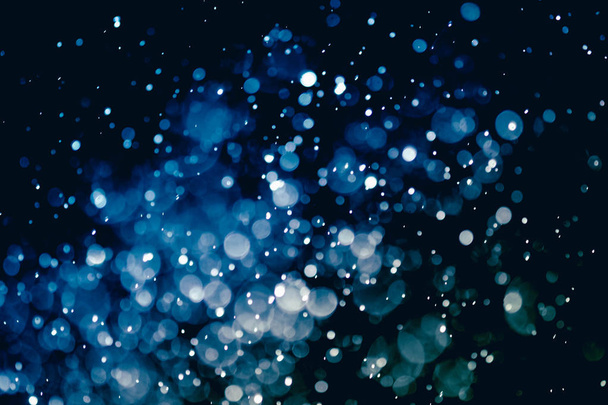 Vánoční rozostření bokeh textury abstraktní světlo v pozadí glitterin - Fotografie, Obrázek