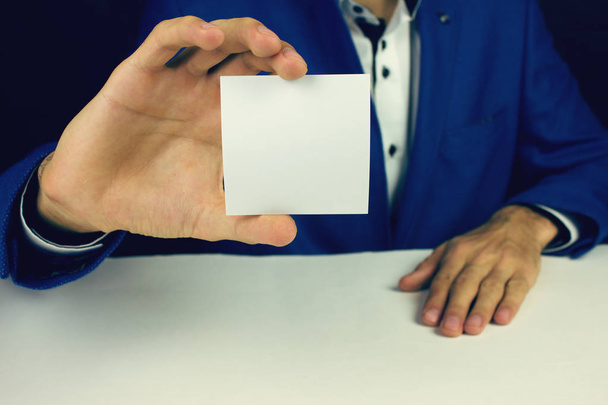 man holding a piece of paper - Foto, Imagen