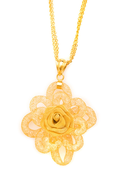 Golden necklace isolated on the white - Photo, image