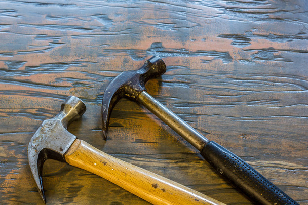 Hammers on a tabletop - Фото, зображення