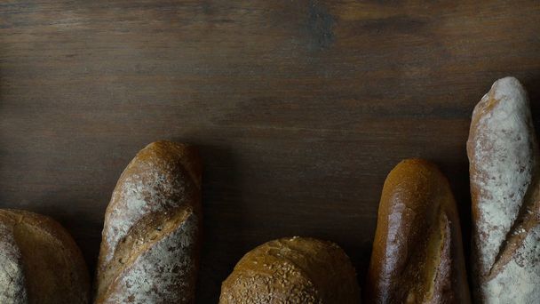 Bread  Wheat oats on wood  image background. - Foto, afbeelding