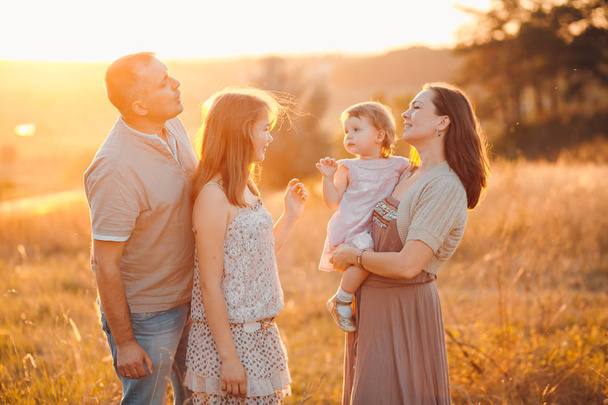 family in a field - Photo, Image