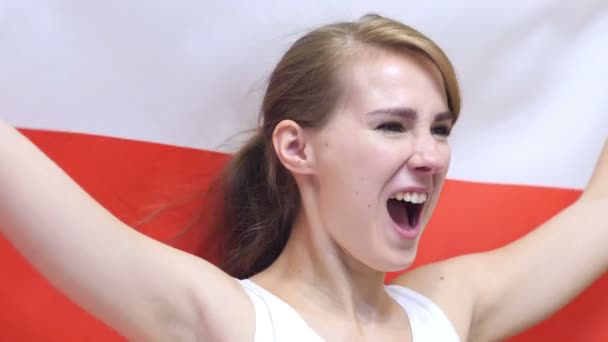 Polish Young Woman Celebrates holding the Flag of Poland in Slow Motion - Footage, Video