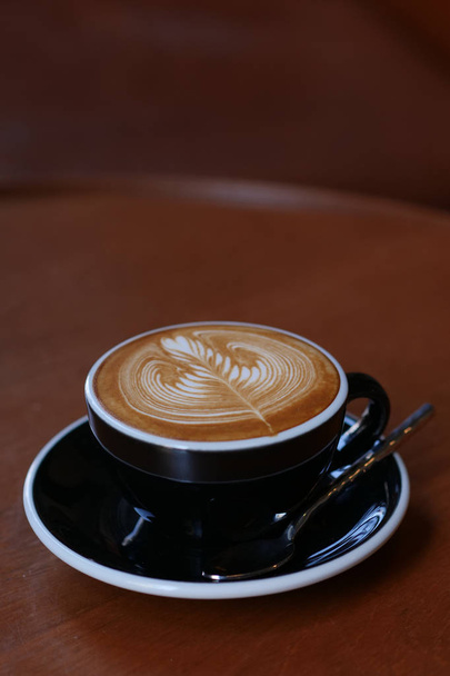 coffee latte art in coffee shop cafe  - Fotoğraf, Görsel