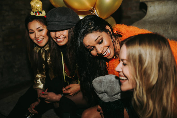 Group of girls celebrating and having fun the club. Concept abou - Valokuva, kuva