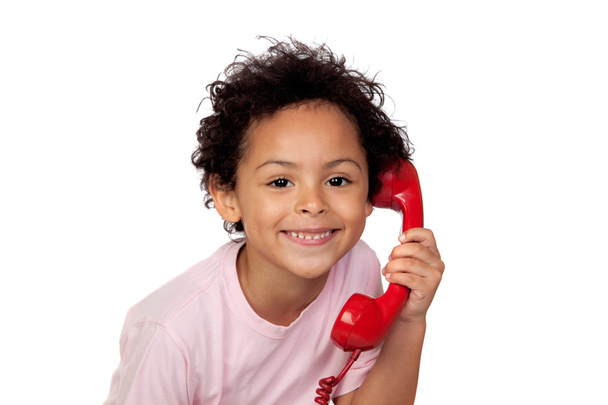 Latin child with red phone - Fotó, kép