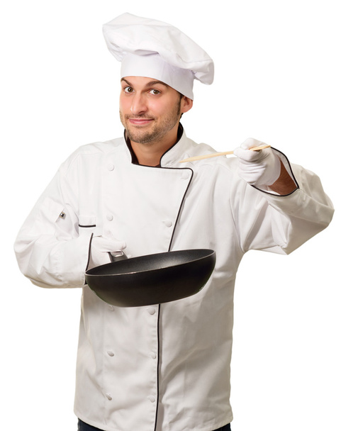 Портрет мужчины-шеф-повара, держащего в руках пан
 - Фото, изображение