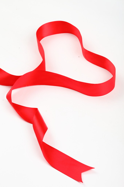 Red ribbon forming heart - Photo, Image