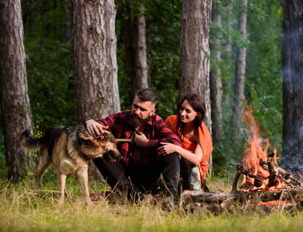 Woman and handsome man on vacation, hiking, camping. - Foto, Imagen
