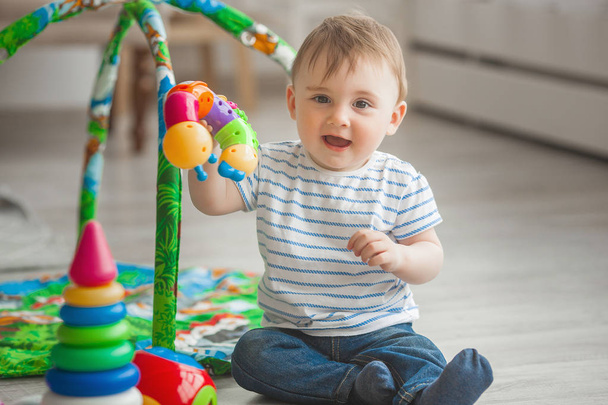 Cute little child playing indoors. Pretty infant baby boy - Fotoğraf, Görsel